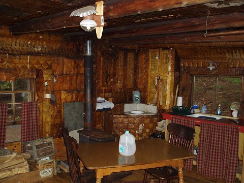 The interior of the main cabin.  That's all birch bark on the walls, ceilings, window and door frames.