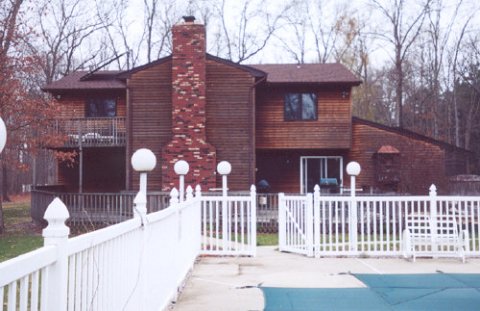 The pool's still covered for wintertime. Those are solar panels on the left roof, for a hot water heater.