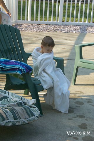 The acolyte sits in meditation.